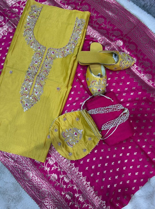 CHANDERI FABRIC SUIT WITH NECKLINE WORK DOLA DUPTTA  JUTTI AND POTLI (SUIT1122)